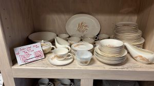 set of ivory China dishes with a wheat pattern