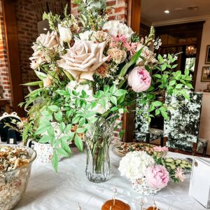 vase of flowers set on a table