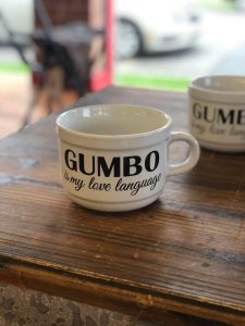 white bowl with handle, design says, "Gumbo is my love language"