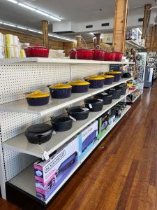 store row of cast-iron pots