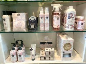 display shelf with lotions and sprays