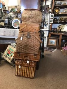 Picnic baskets stacked on top of each other