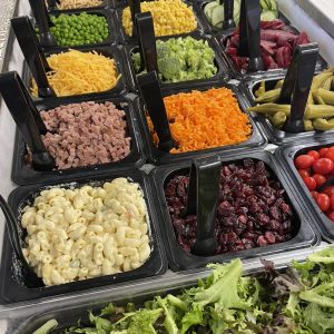 salad bar with colorful toppings