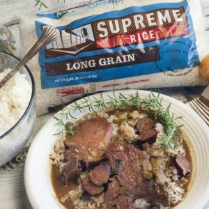 bag of Supreme Rice next to a bowl of rice and gravy