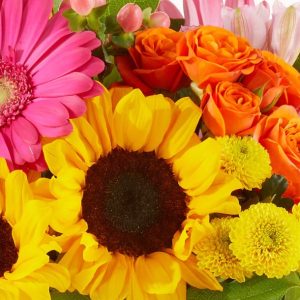 close up of bouquet featuring sunflower