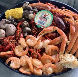 tray of assorted boiled seafood and sides