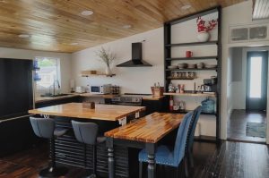 kitchen with butcher block island and wooden ceiling
