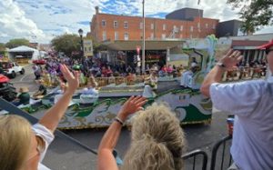 The International Rice Festival parade float, picture taken from the crowd of onlookers