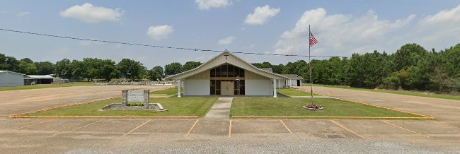 Church building with American flag flying out front