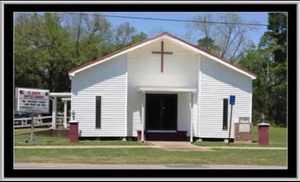 white wooden church building