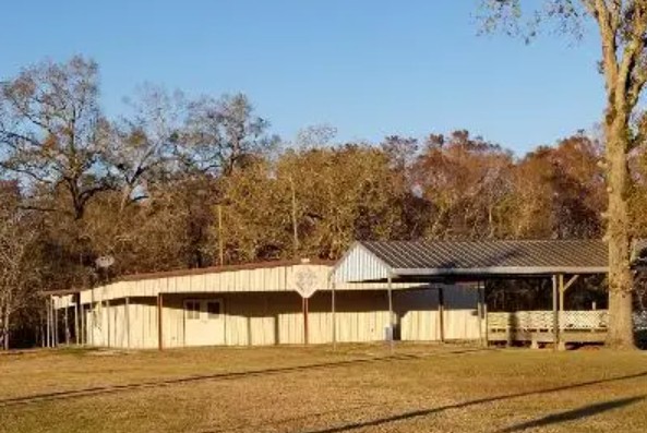 Estherwood KC Hall with trees in the background