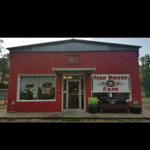 Red building front with Fire House Cafe sign