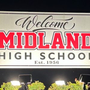 Midland High School sign between two pillars