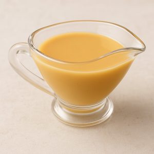 rum sauce in a glass pitcher